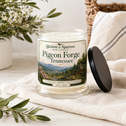 Pigeon Forge Tennessee candle styled in a cozy bright home setting