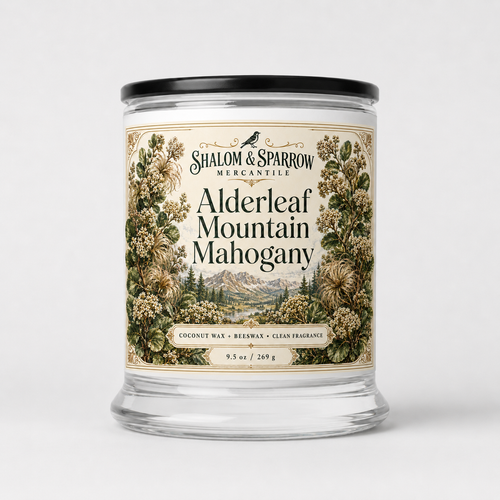 Alderleaf Mountain Mahogany teakwood and leather candle in glass jar with flora inspired label